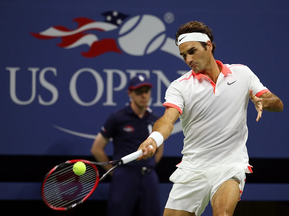 Roger Federer whips out a forehand in this quarter-final match of the US Open against Richard Gasquet. (Photo: AP)