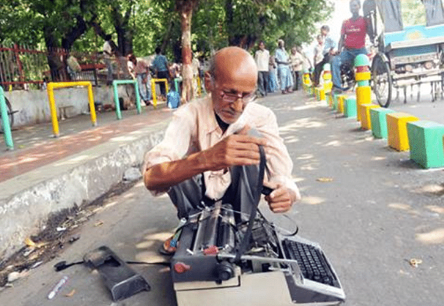 UP government suspended a cop after his images of smashing the typewriter of an old man went viral on social media.