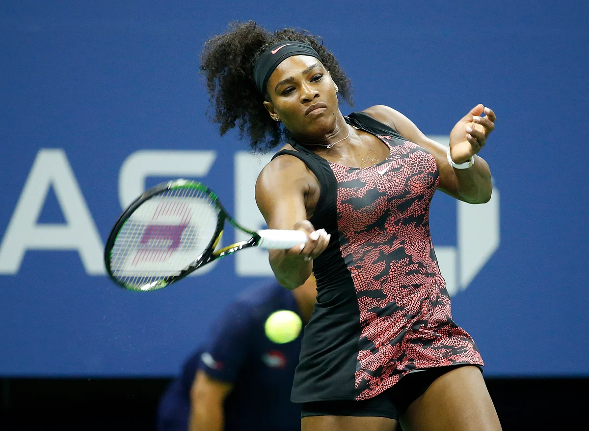 Serena Williams plays a forehand during her quarter-final match in the US Open against Venus Williams on Tuesday. (Photo: AP)