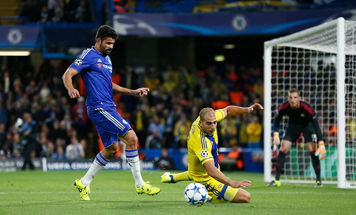 Chelsea’s Diego Costa in action with Tel Aviv’s Tal Ben Haim during their Champions League group match. (Photo: Reuters)