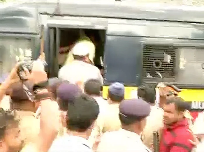 Police taking the MNs workers away. (Photo: ANI)
