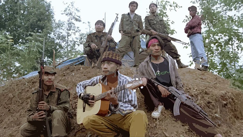 Members of the rebel outfit NSCN(K) parade around their camps, armed with guns and guitars. (Photo: Reuters)
