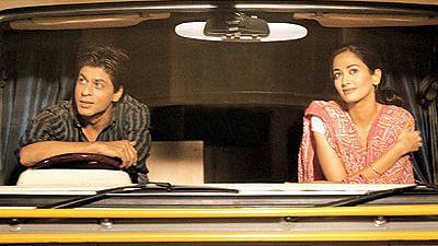Shah Rukh Khan and Gayatri Joshi inside Shah Rukh’s caravan in a scene from <i>Swades</i>. (Photo Courtesy: <a href="https://www.facebook.com/Swades.Movie/photos_stream?tab=photos">Facebook/Swades</a>)