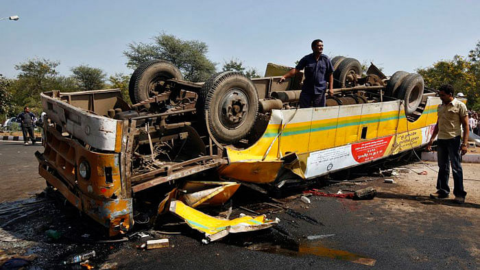 An overturned bus after an accident in Gandhinagar, Gujarat. (Photo: Reuters)