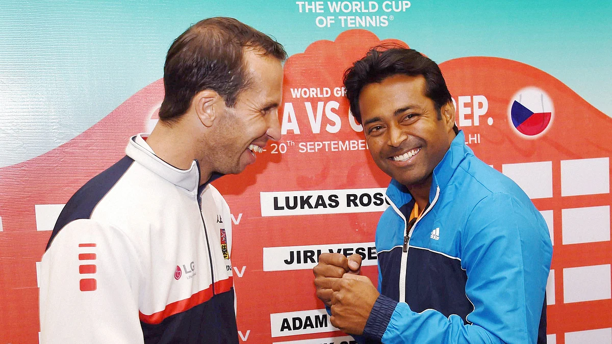 India’s Leander Paes, right, and Radek Stepanek of Czech Republic share a light moment before the draw ceremony on Thursday. (Photo: PTI)