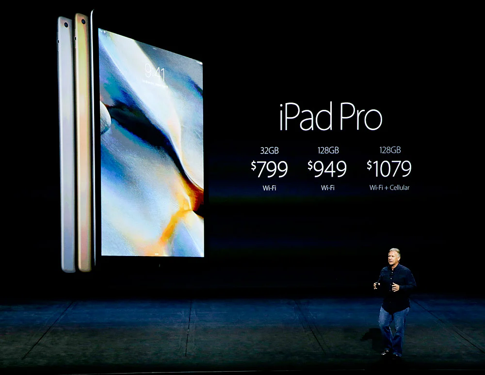 Phil Schiller announces the pricing for the iPad Pro during the Apple event. (Photo: AP)