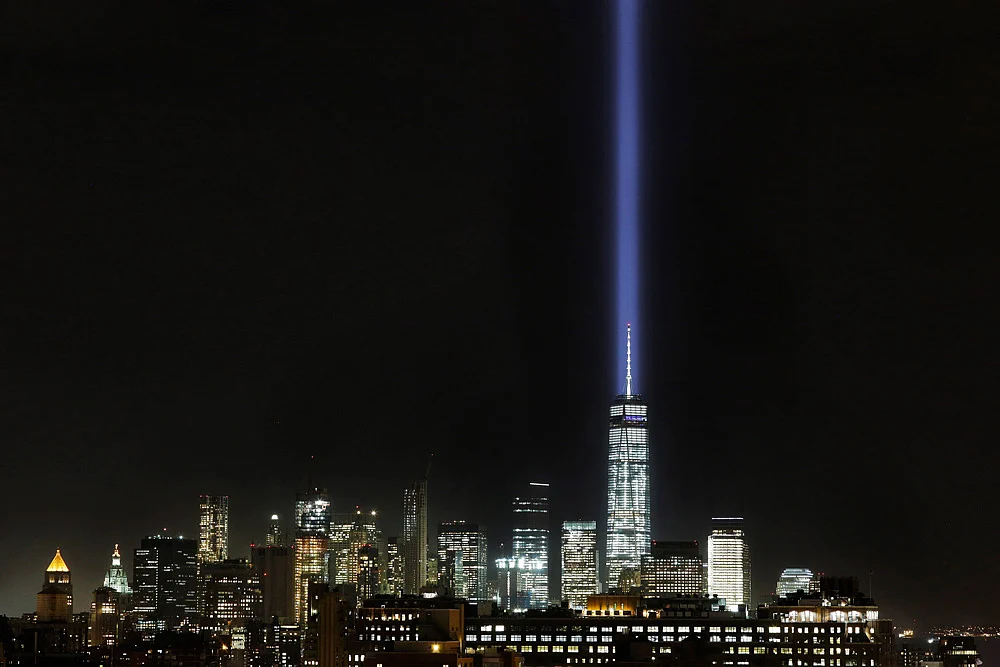 The Tribute in Light illuminates the sky behind One World Trade Center. (Photo: AP)