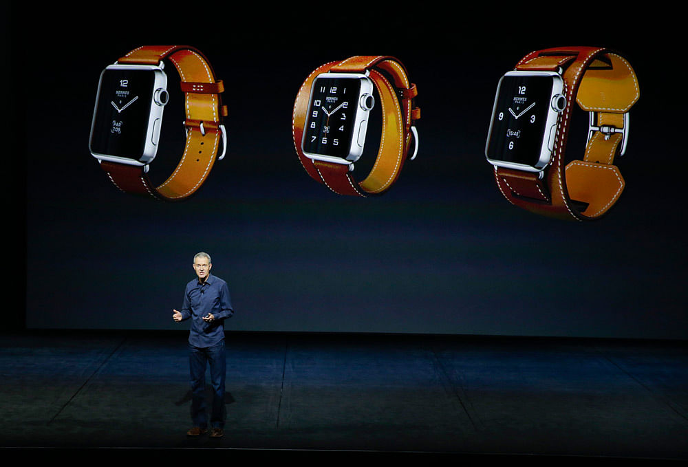 Apple Chief Executive Tim Cook comes out with some key announcements in front of a packed house in san Francisco