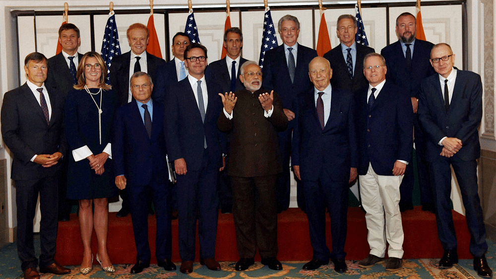Prime Minister Narendra Modi with media baron Rupert Murdoch, his son James and others before a round table meeting on Media, Technology and Communication -- Growth Story for India, in New York on Thursday. (Photo: PTI)