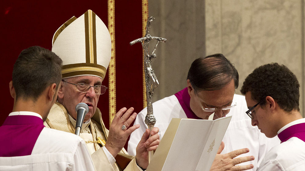 A file photo of Pope Francis delivering his blessing at the end of a prayer  at the Vatican.