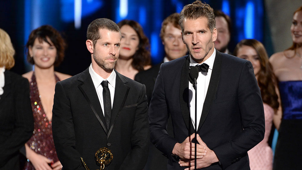 DB Weiss (left) and David Benioff accept the award for outstanding drama series for “Game Of Thrones” at the 67th Primetime Emmy Awards. (Photo: AP)