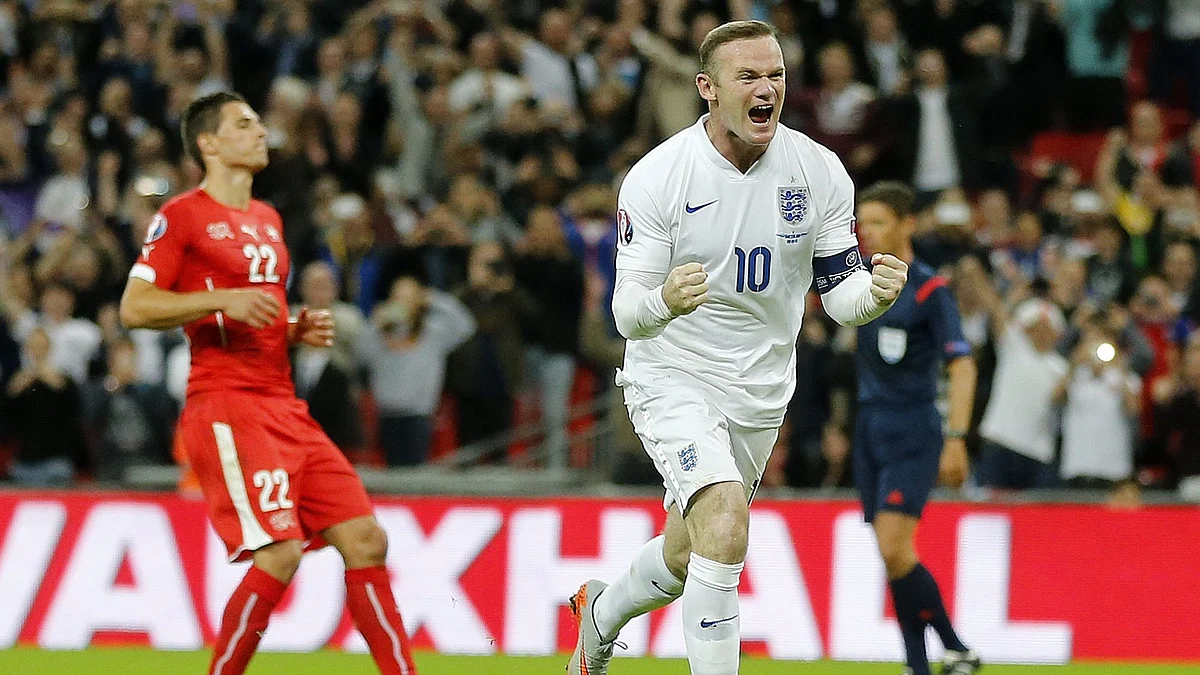Wayne Rooney celebrates after scoring his 50th international goal for England. (Photo: AP)