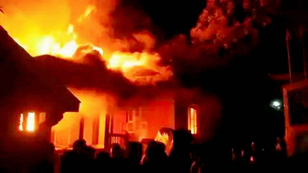 A mob set ablaze the residences of a Manipur minister and two other legislators in Imphal to protest&nbsp;the passage of allegedly “anti-tribal” bills. (Photo: PTI)