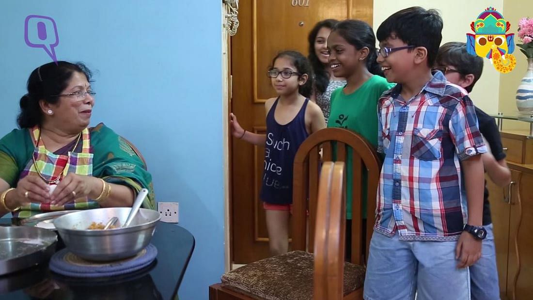 Arati <i>mavshi</i> teaching kids how to make the perfect Modak (Photo: The Quint)