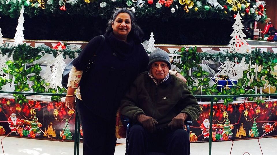 Sangeeta Murthi Sahgal at a city mall with her father who was diagnosed with Parkinson’s Disease in 2008. (Photo Courtesy: Sangeeta Murthi Sahgal)
