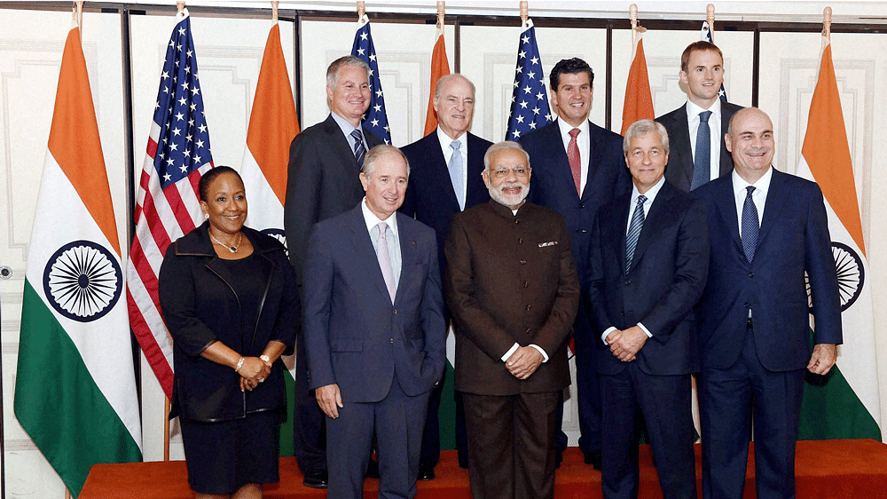 Prime Minister Narendra Modi poses before a meeting with officials of top financial institutions in New York, September 24, 2015. (Photo: PTI)