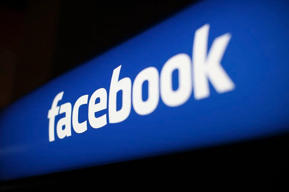 Facebook prompted me to tag one of my friends in the photo with absolutely no input from me. (Photo: Reuters)
