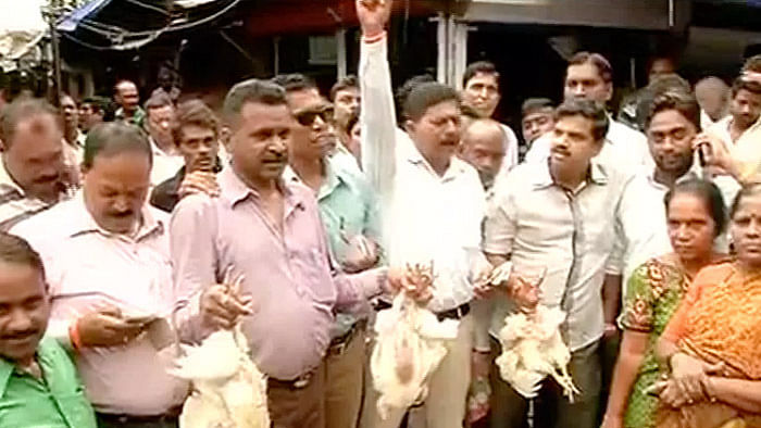MNS workers protesting against the 4-day meat ban. (Photo ANI)