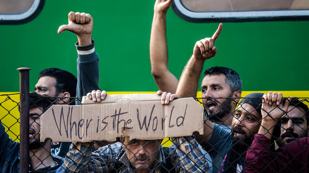 Migrants demonstrate at the Bicske Railway Station in  Hungary. (Photo: AP)