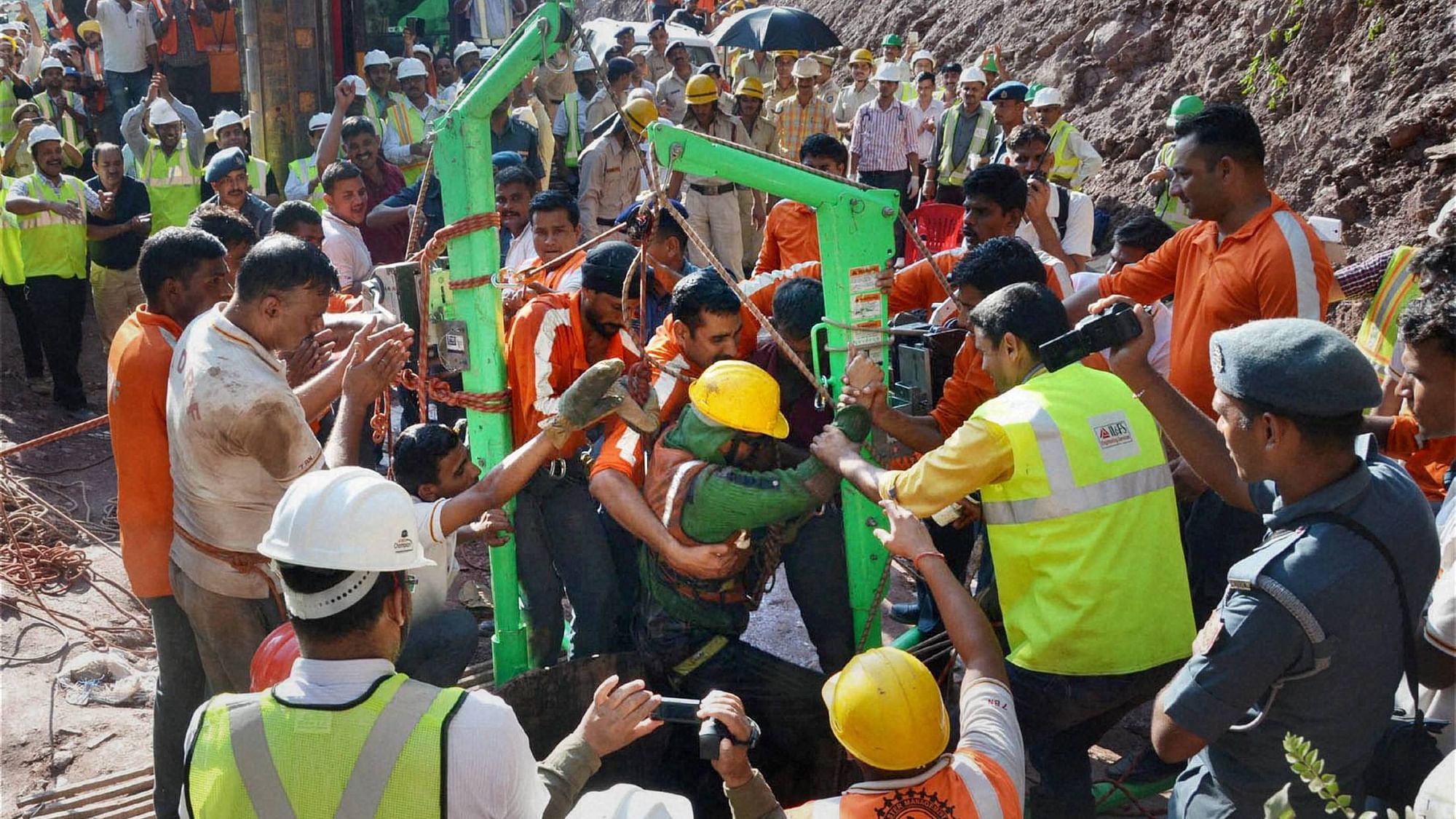 NDRF personnel taking out one of the trapped workers from the Bilaspur tunnel in Himachal Pradesh on Monday. (Photo: PTI)
