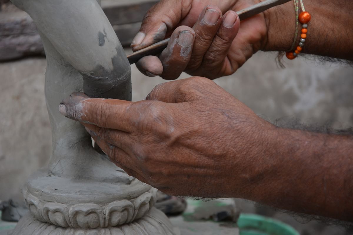 While Kumartuli kicks into overdrive, putting life into clay, Bengal gears up to welcome its beloved Durga Puja.
