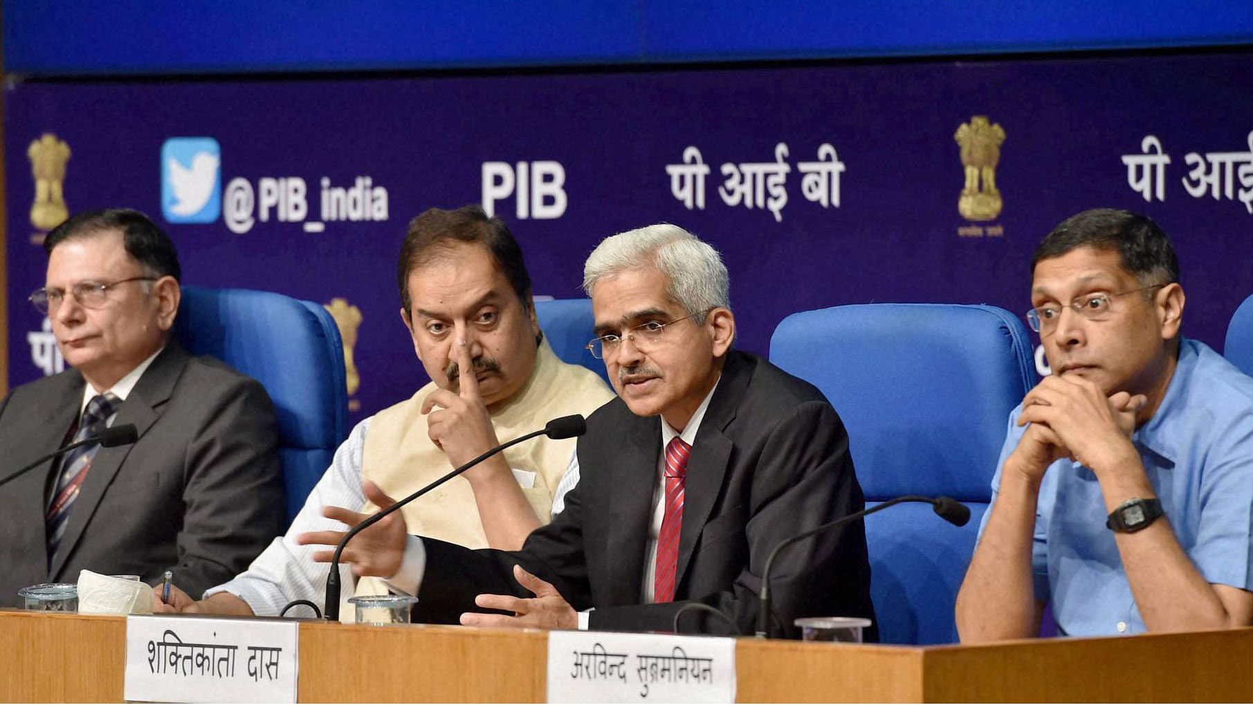 (From left to right) Finance Secretary, Ratan P Watal along with Shaktikanta Das, Secretary (DEA) and the Chief Economic Adviser (CEA) Arvind Subramanian holding a press conference in New Delhi on Monday. (Photo: PTI)