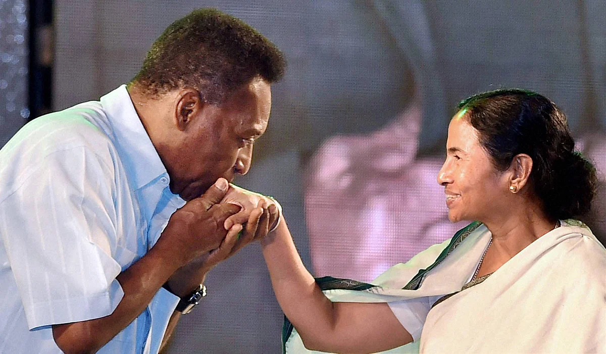 Legendary Brazilian footballer Pele greets West Bengal Chief Minister Mamata Banerjee at a function in Kolkata on Monday. (Photo: PTI)