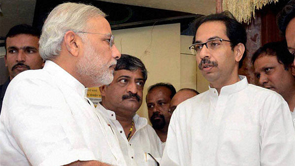 File image of Shiv Sena chief Uddhav Thackeray and Narendra Modi. (Photo: PTI)