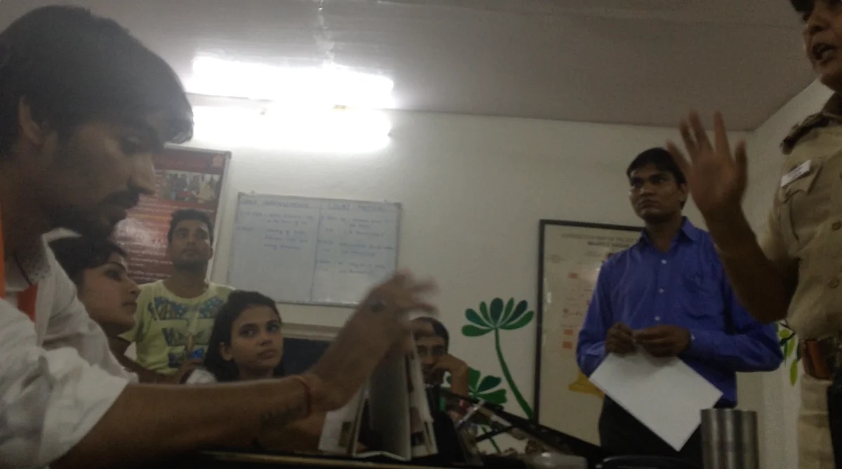 Satender Awana (L), Priya Sharma (second from L), Anjali Rana (third from L) being schooled by SHO Arti Sharma (extreme R) (Photo: The Quint)