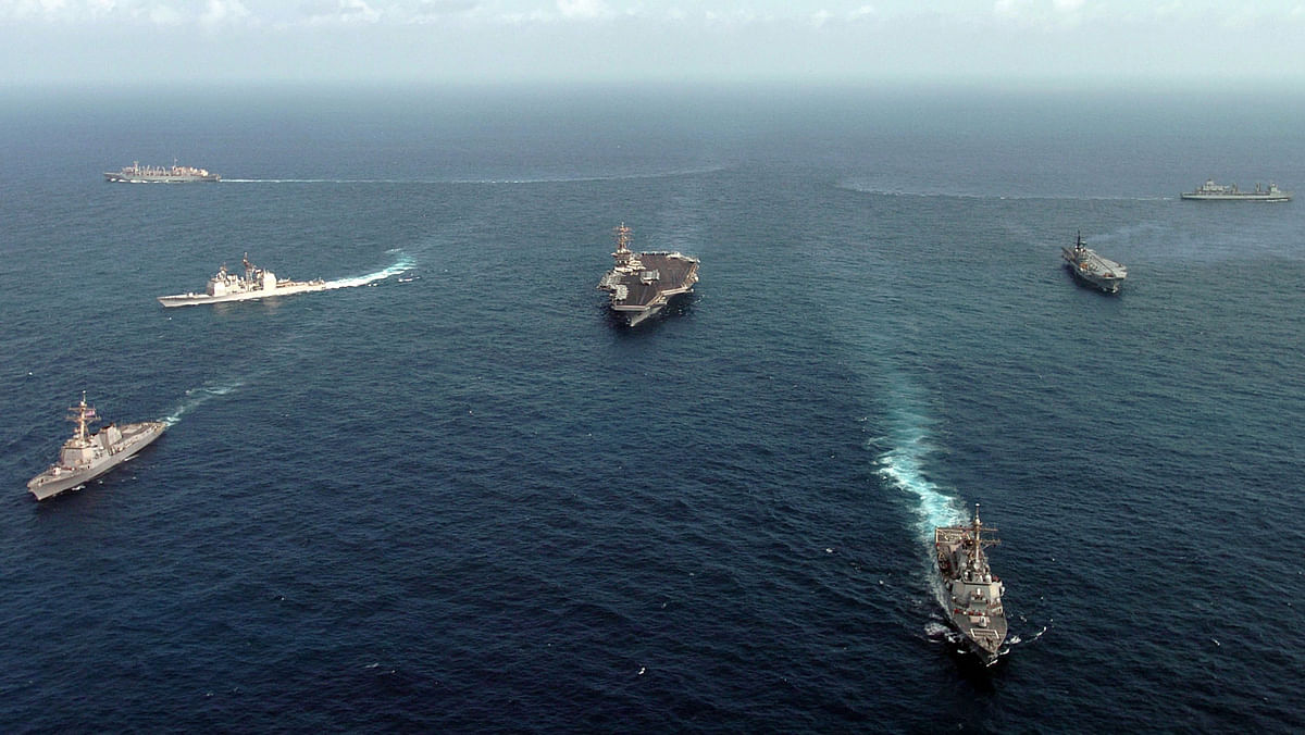  Ships assigned to the USS Nimitz Carrier Strike Group and the Indian aircraft carrier Viraat (R 22) underway in formation during Exercise Malabar 2005. (Photo: wikimedia commons)