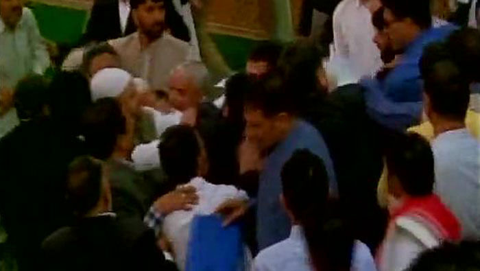 BJP MLAs beating up MLA Sheikh Abdul Rashid in J&amp;K Assembly. (Photo: ANI)