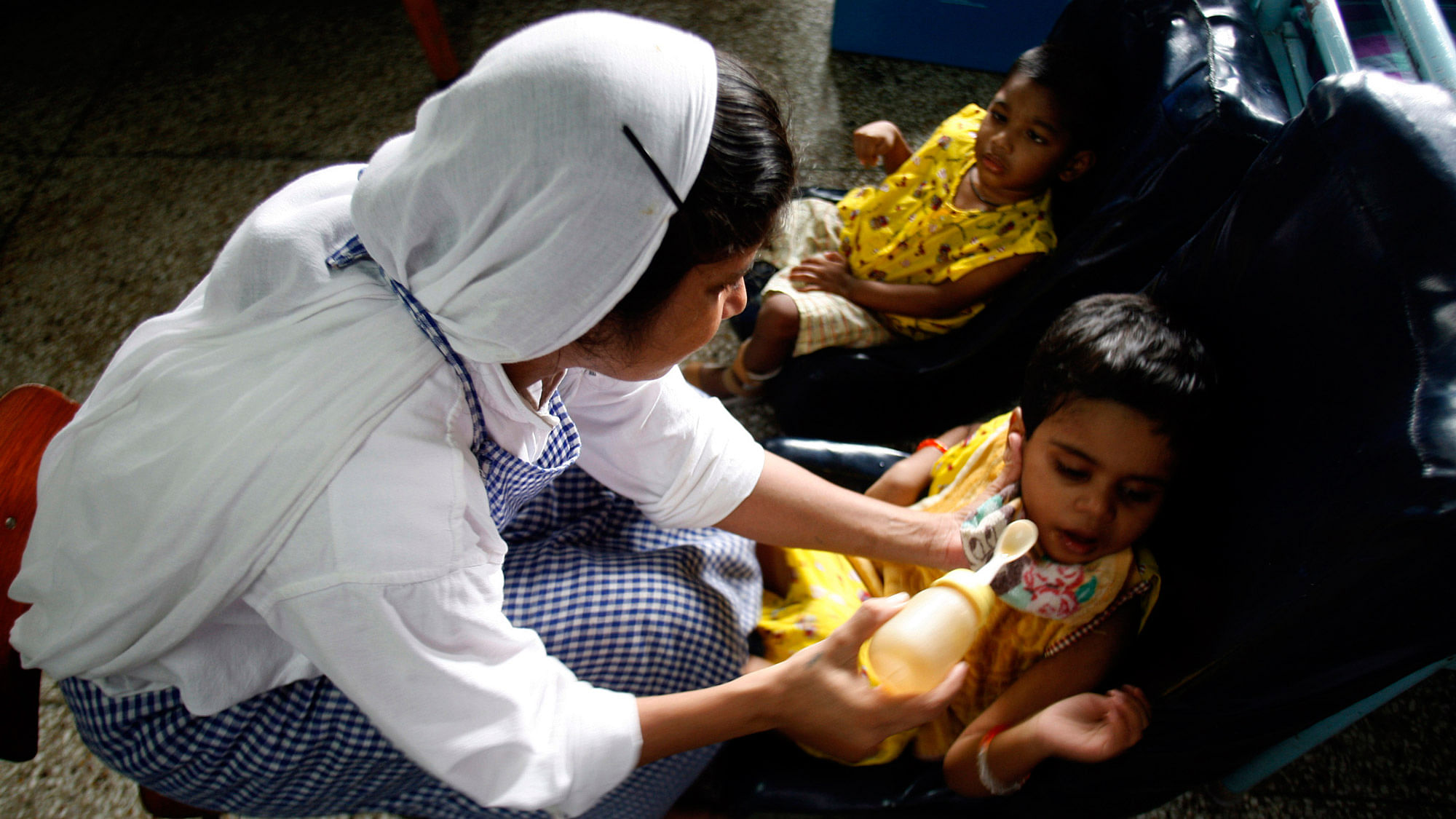 File picture of a nun belonging to the  Missionaries of Charity feeding an orphan at “Shishu Bhavan”, Kolkata.  (Photo: Reuters)