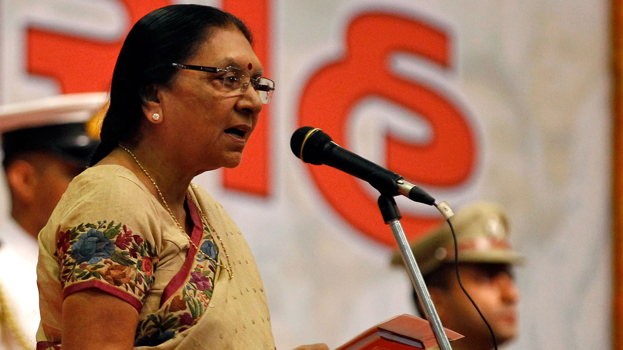 Anandiben Patel, the newly appointed chief minister of the western Indian state of Gujarat, takes her oath during a swearing-in ceremony at Gandhinagar. (Photo: Reuters)