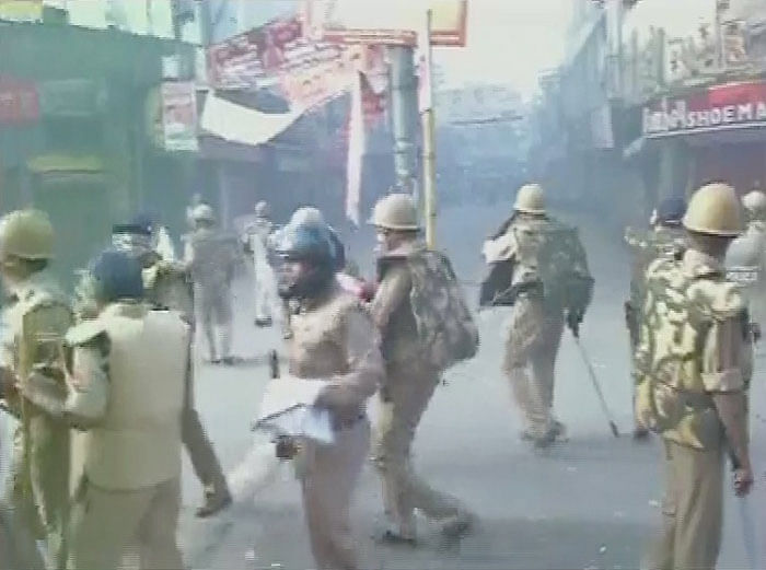 Hindu protesters in Varanasi took to the streets against lathi-charge on godmen on 22 September.