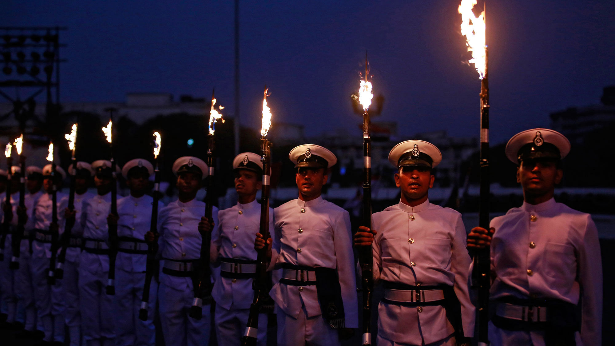 Indian Navy soldiers demonstrate their skills while holding their weapons during Navy Day celebrations&nbsp;