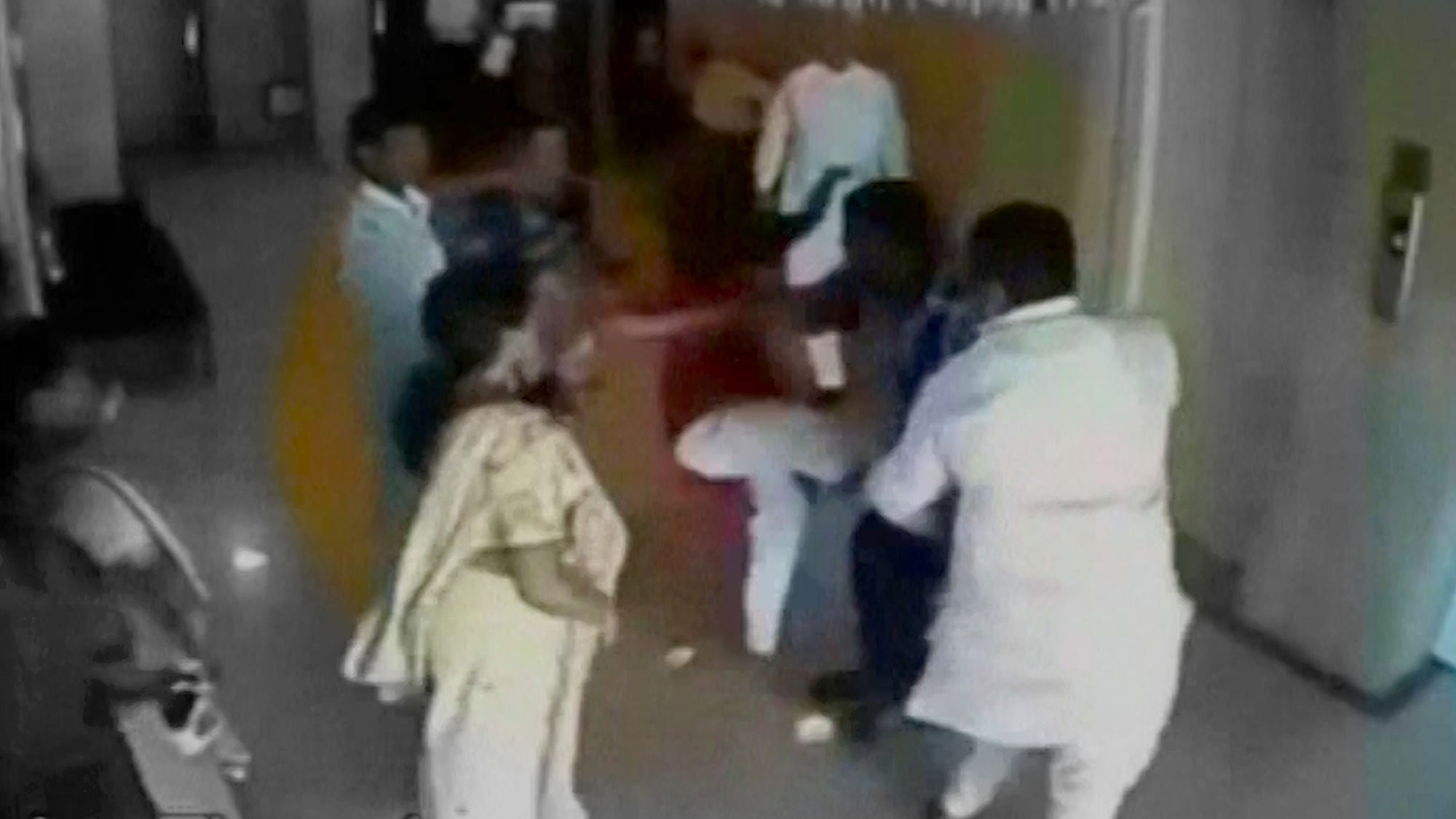 BJP leader Naveen Patel seen thrashing a woman in Daman. (Photo: ANI screengrab)