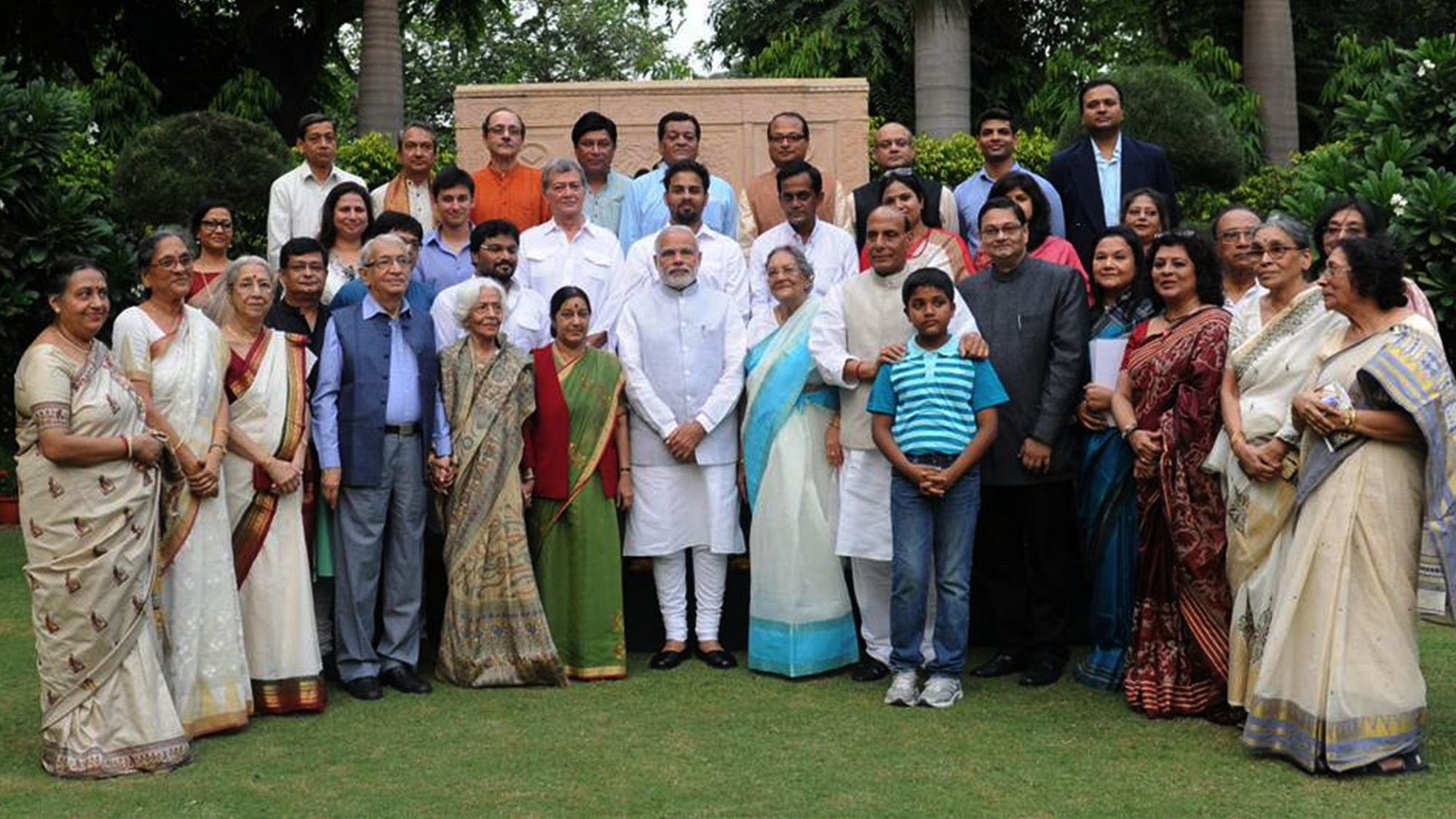 Prime Minister Narendra Modi in a group photograph with the family members of Netaji Subhas Chandra Bose, at 7, Race Course Road, in New Delhi on Wednesday. (Photo: PTI)