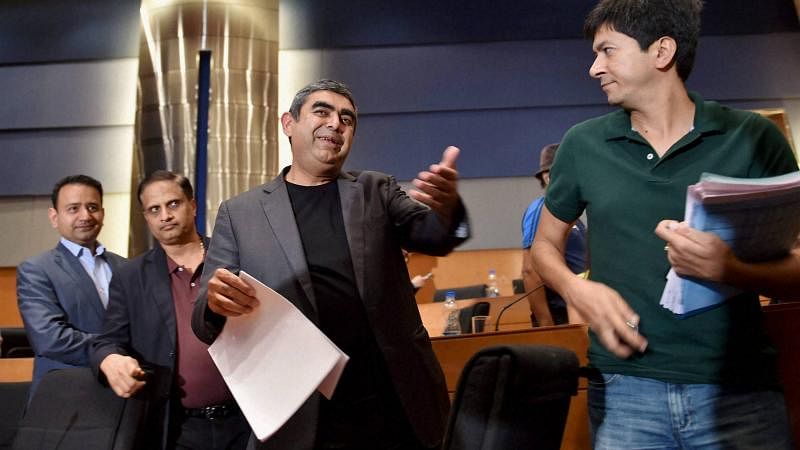 Ex-CEO of Infosys Technologies Vishal Sikka (centre).