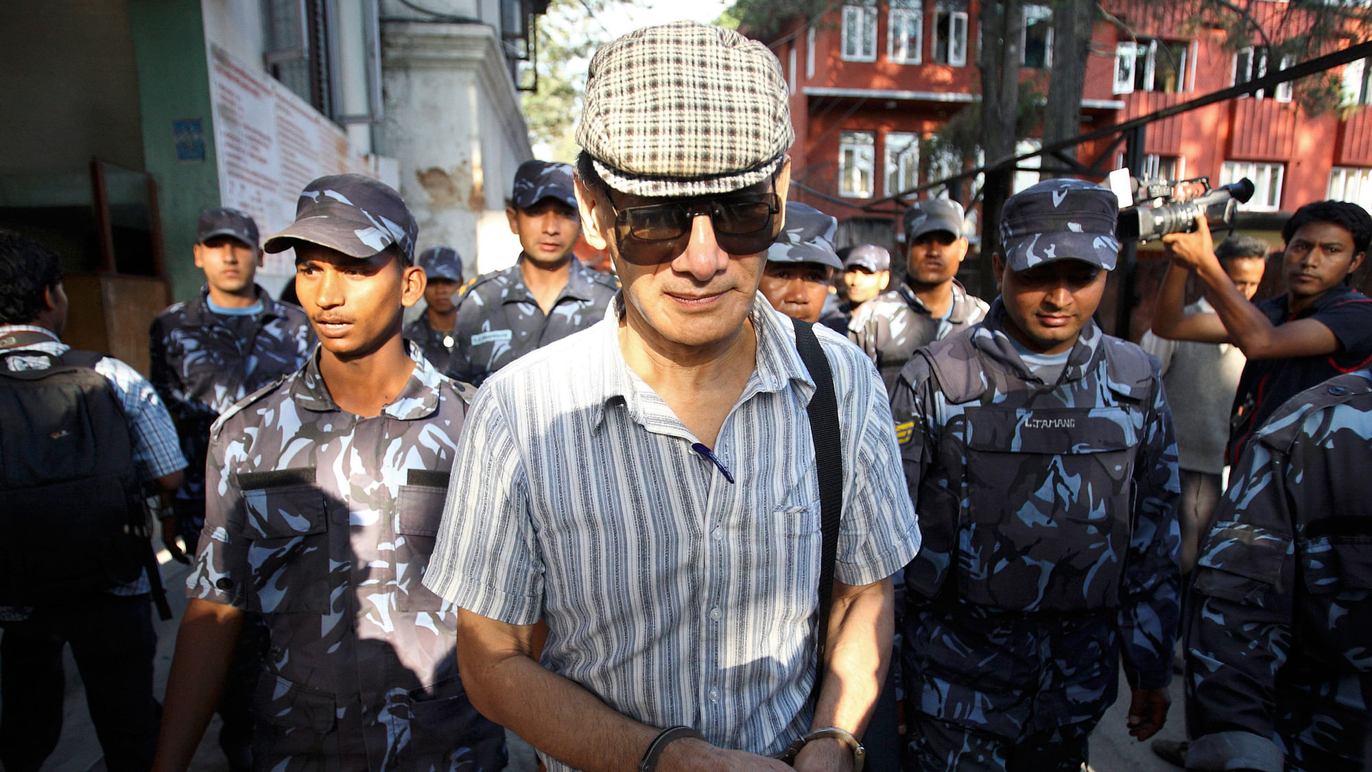 Charles Sobhraj leaves Kathmandu district court after his hearing in Kathmandu in 2011. (Photo: Reuters)