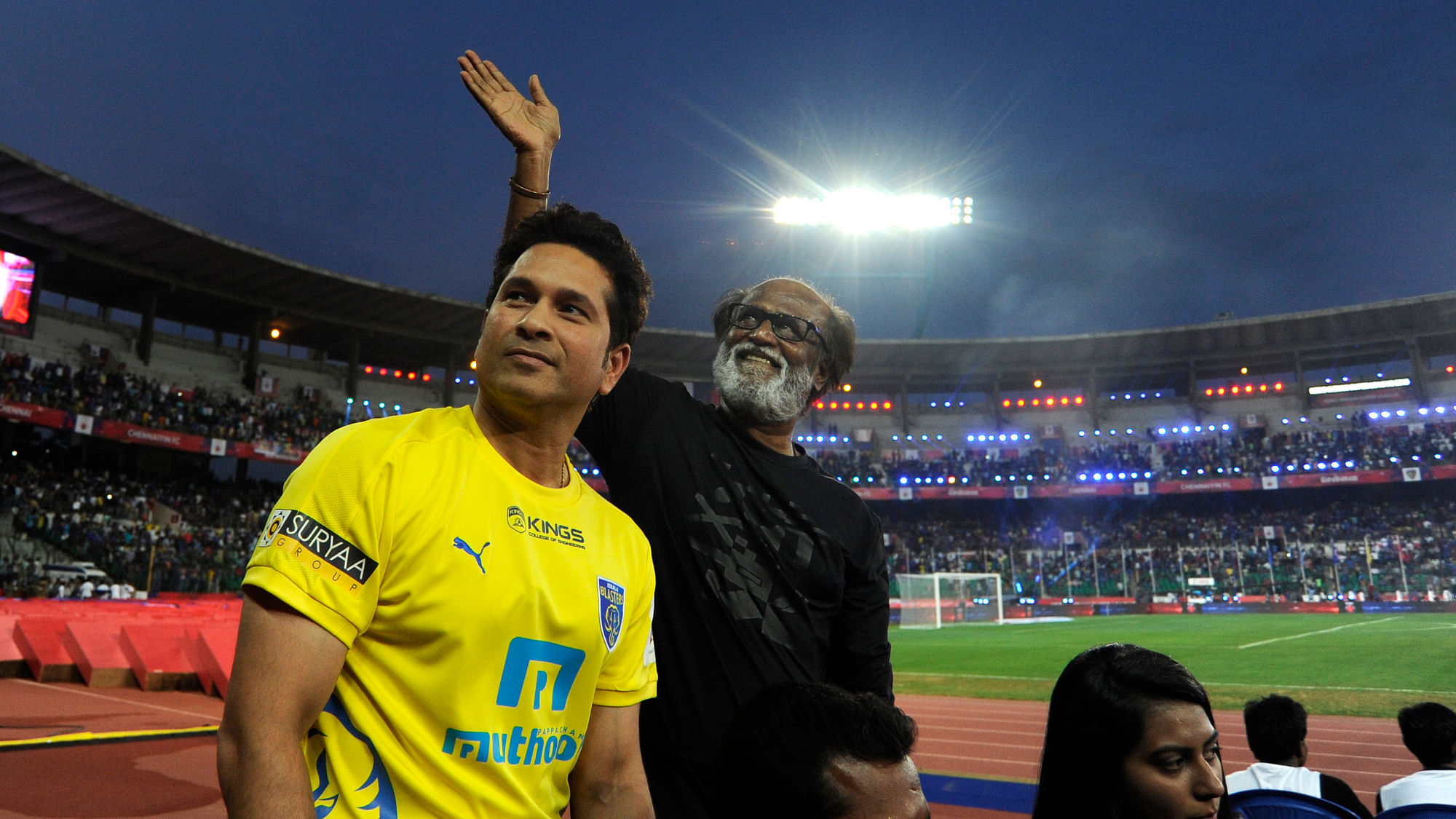 Rajnikanth and Sachin Tendulkar wave to the crowd during the opening ceremony of the Indian Super League (ISL)  held at the Jawaharlal Nehru Stadium. (Photo: ISL)