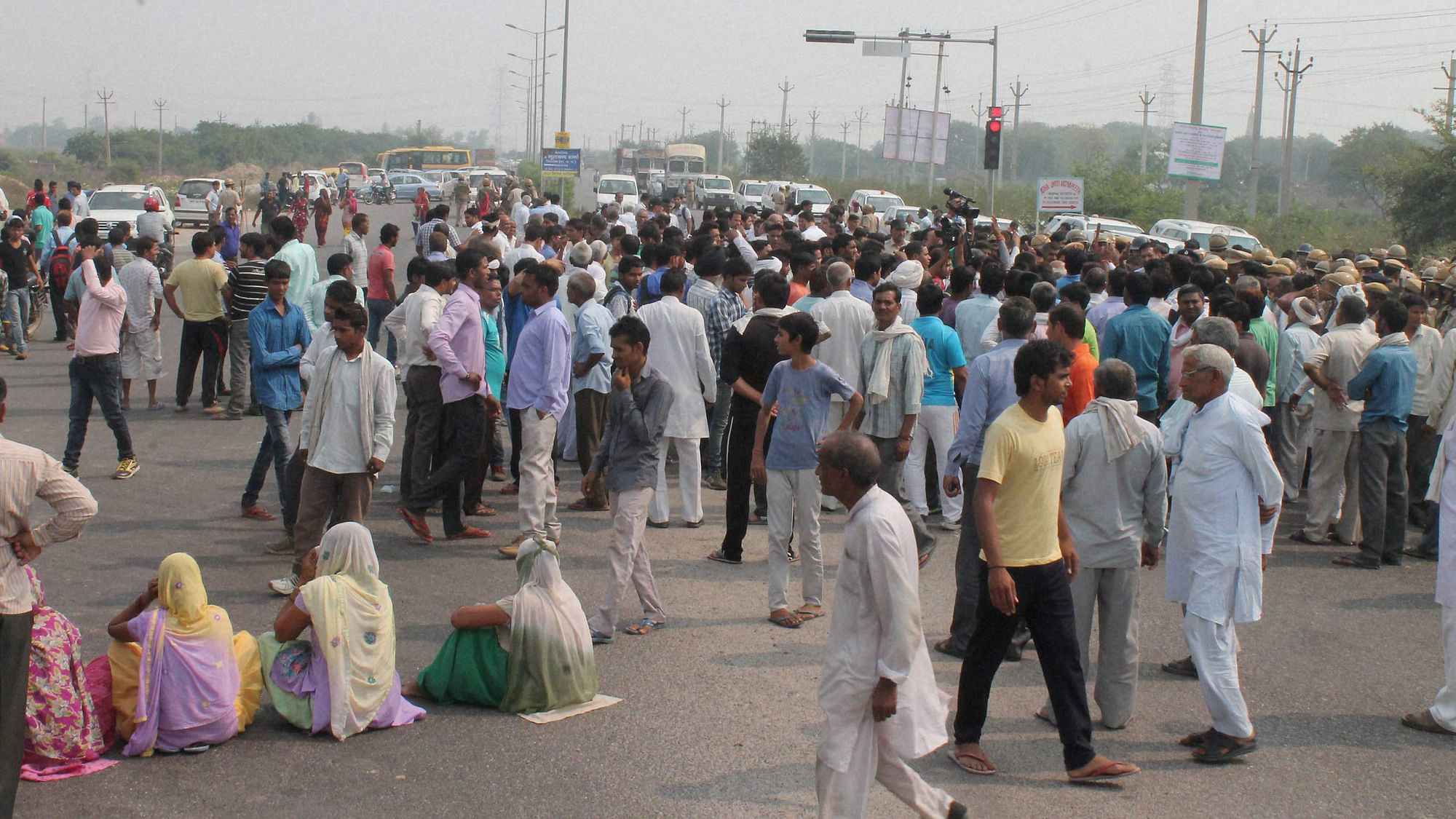 People block a road during a protest against Sonpedh village incident in Faridabad. (Photo: PTI)