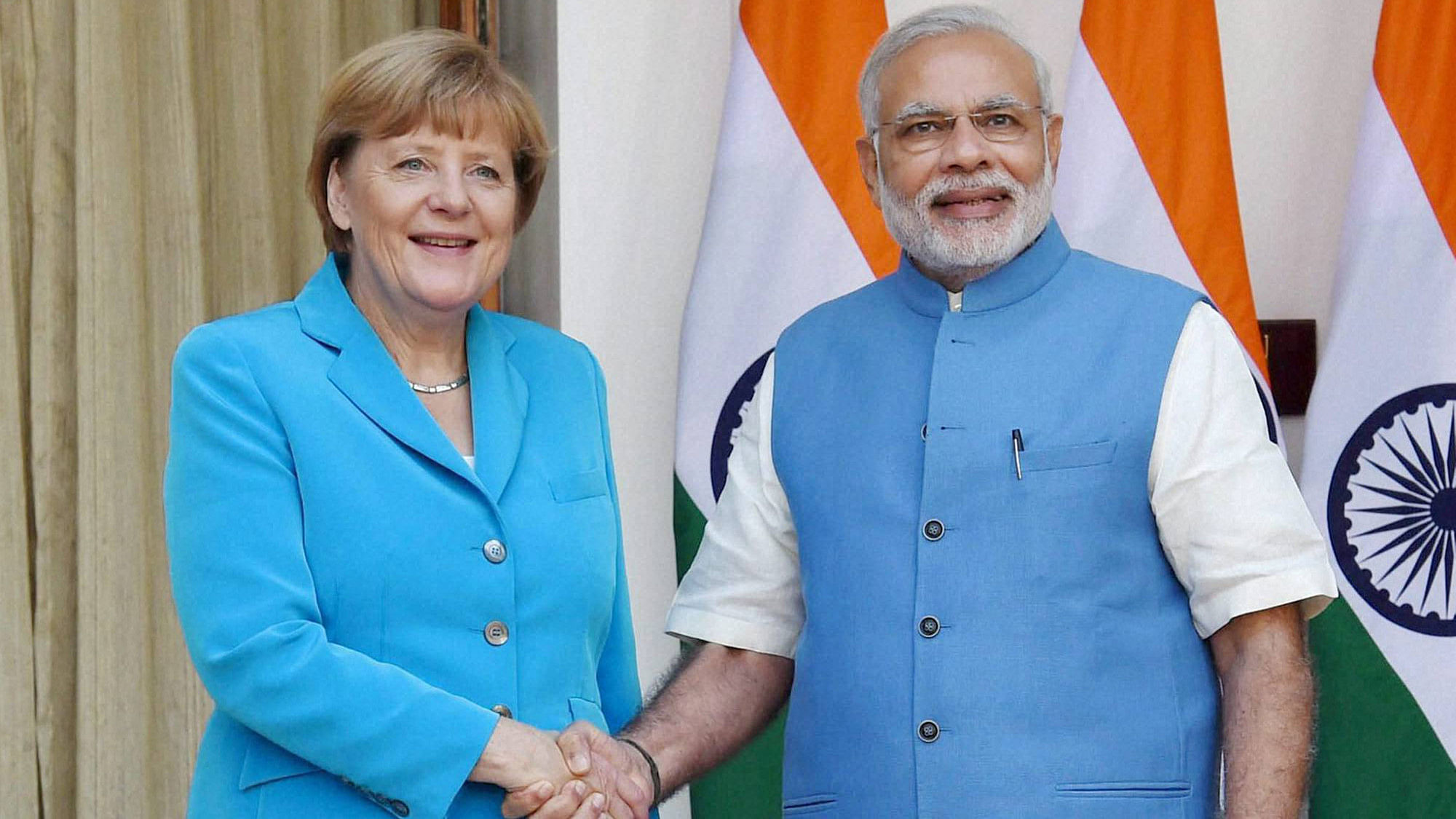 Prime Minister Narendra Modi (right) with German Chancellor Angela Merkel (left) at Hyderabad House in New Delhi on Monday. (Photo: PTI)