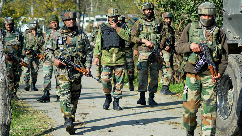 Army personnel in action during an operation against militants in Khandaypora in Kulgam district. Image used for representation. (Photo: PTI)