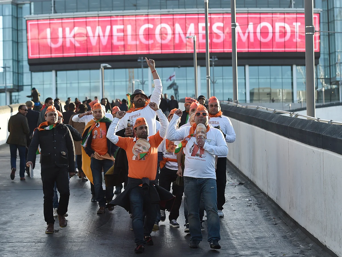 People walk towards Wembley stadium ahead of Modi’s speech. (Photo: Reuters)