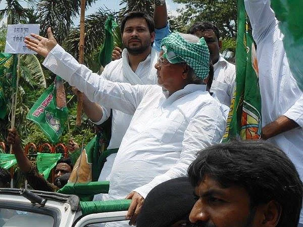 Lalu Prasad Yadav in a campaign rally with son, Tejaswi Yadav. (Photo: Facebook.com/laluprasadyadav)