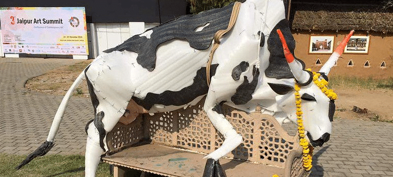 The cow-in-the-sky art installation at Jaipur Art Summit that was brought down after it led to a row. (Photo: Twitter)