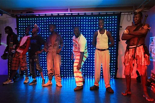 Contestants stand on stage, during the 2015 edition of the Mr Ugly competition, in Harare. (Photo: AP)
