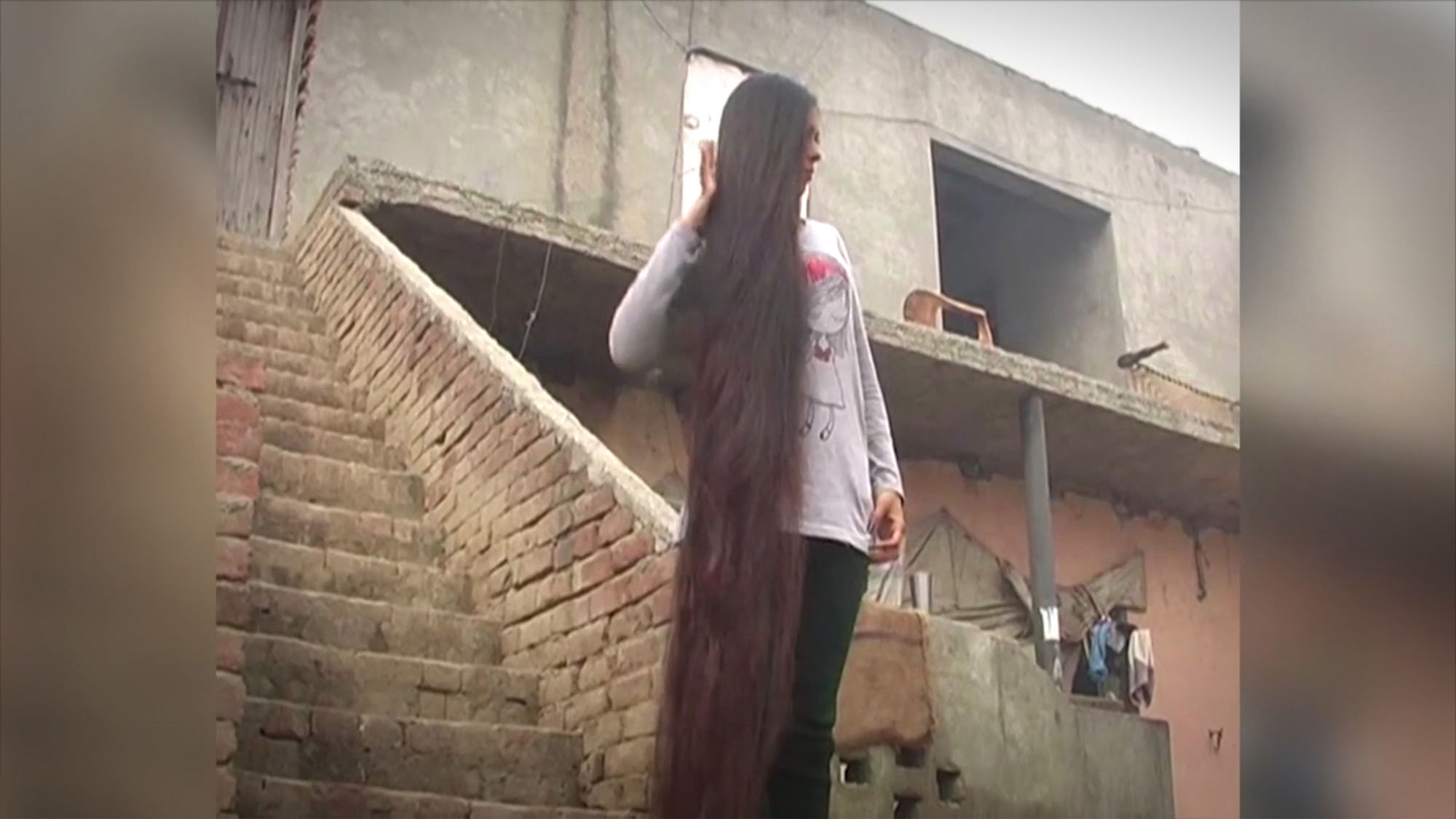 Priyanka Chaudhary from vilage Baghpat, Uttar Pradesh, whose hair measures 6.5 feet. (Photo: AP screengrab)