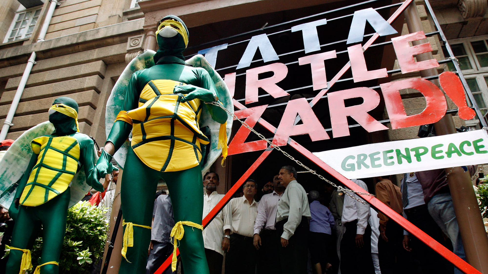 A Greenpeace activist dressed as a turtle protests outside the head office of the Tata group, claiming that a port being built by the group in Orissa will kill endangered Olive Ridley turtles and other marine life. (Photo: Reuters)