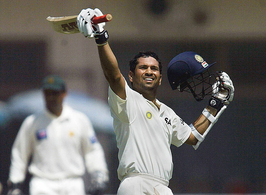 Sachin Tendulkar is jubilant after scoring another hundred. (Photo: Reuters)